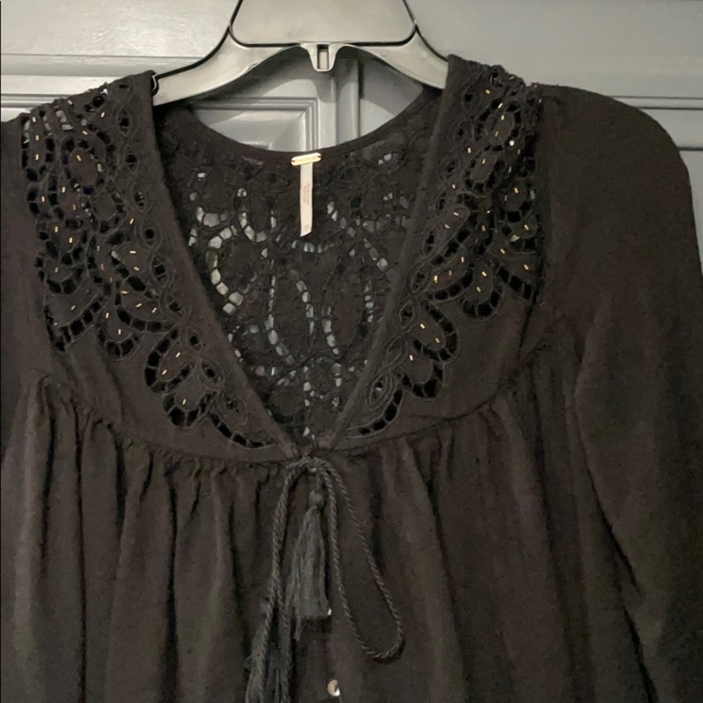 Free People black gauze cut out blouse.